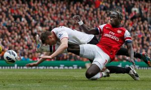 Arsenal's Bacary Sagna challenges Manchester United's Phil Jones