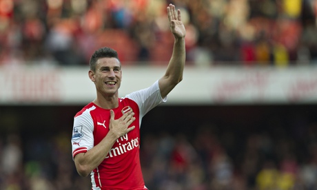 Laurent Koscielny celebrates his goal against Crystal Palace but he is an injury doubt for Tuesday's